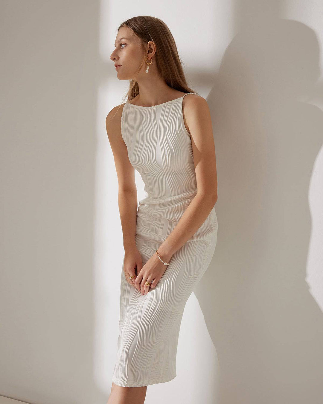 Vestido camisola texturizado com efeito ondulado da água